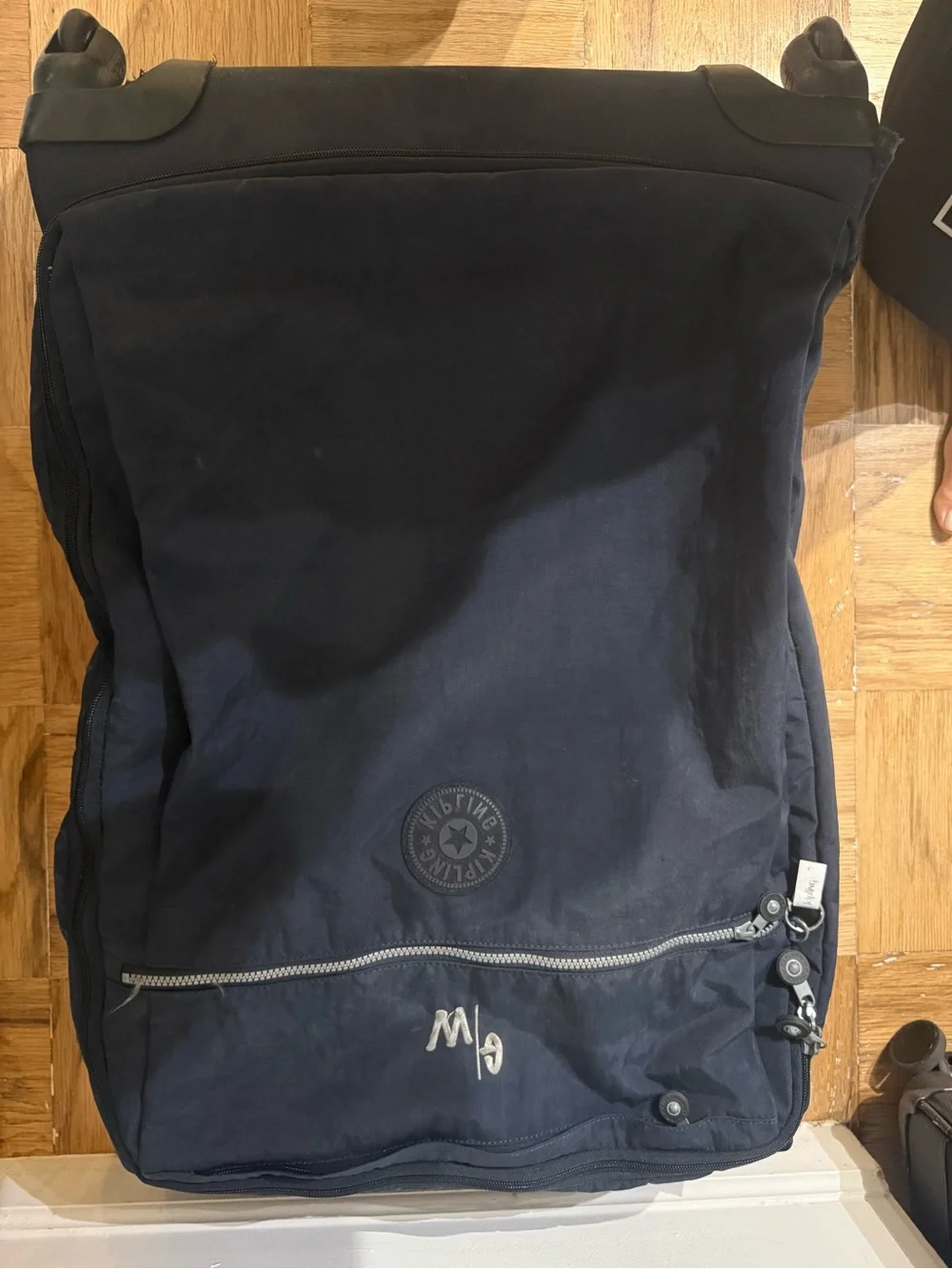 Kipling Dark Navy Upright Rolling Suitcase with Monkey Charm